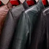Multiple men’s leather jackets in different styles and colors, showing outfit inspiration for how to style leather jacket men in 2025.